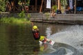 an athlete trains and shows tricks on the water while doing sports wakeboarding