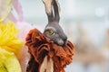 KIEV, Ukraine - September 06 ,2020: Author`s doll made in the technique of realism. Fairytale March Hare in a red jabot Royalty Free Stock Photo