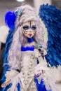 KIEV, Ukraine - September 06 ,2020: Author`s doll made in the technique of realism. Girl in white clothes with blue angel wings o