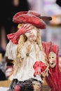 KIEV, Ukraine - September 06 ,2020: Author`s doll made in the technique of realism. Musketeer in a red hat