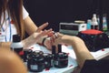 Kiev, Ukraine ÃÂ¢Ã¢âÂ¬Ã¢â¬Å 19 September, 2018: Manicure Master make gel nail extension during master-class at the beauty show
