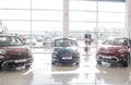 Kiev, Ukraine - September 11, 2018. Picture of three nice Fiat cars standing inside trading salon with glass walls. It