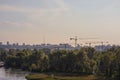 Kiev, Ukraine - SEPTEMBER 13th 2020 View of the promenade and city with building under construction. With many cranes. Kyiv.