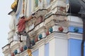 Kiev, Ukraine - September 04, 2015: Worker-restorer working at height