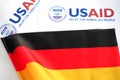 Kiev, Ukraine - 02 12 2023: USAid logo and Germany flag, USAid is USA agency for international development - assistance abroad, Royalty Free Stock Photo