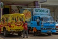 These are two delivery vans on a parking lot in KN 2 Avenue