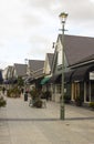 Kildare Village shopping outlet Ireland. Shoppers browsing the shops looking for bargains in this luxurious retail park