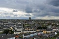 Kilkenny city with the St Canice's Cathedral round tower on the heavy clouds, Ireland Royalty Free Stock Photo