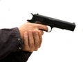 Killer holding a gun, Hand holding guns isolated on white background Royalty Free Stock Photo