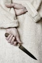 Killer woman with a knife. Violence aggression. Criminal murderer Royalty Free Stock Photo