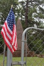 Killough Monument and Cemetery During Rain With American Flag