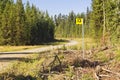 A yellow kilometer marker sign