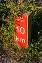 Kilometric indicator in the greenway Los Molinos del Agua in Valverde del Camino, province of Huelva, Spain