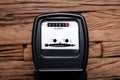 Kilowatt Meter On Wooden Desk Royalty Free Stock Photo