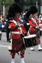 Kilted drummer in marching band in the Calgary Stampede Parade Royalty Free Stock Photo