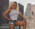 Kim Buck, Enticing Woman Bodybuilder Royalty Free Stock Photo