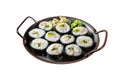 Kimbap gimbap filled with vegetables, egg, eanchovy and crab, Korean rice roll. Isolated on white background. Top view. Royalty Free Stock Photo