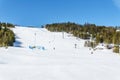 KIMBERLEY, CANADA - MARCH 22, 2019: Mountain Resort view early spring people skiing