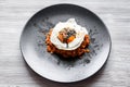 Kimchi bokkeum bap on black plate on wooden board Royalty Free Stock Photo