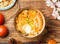 Kimchi Hot Pot Noodles with tomato and chopsticks served in dish on wooden table top view of chines food Royalty Free Stock Photo