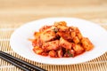 Kimchi radish on white dish, Korean food Royalty Free Stock Photo