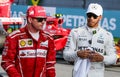 Kimi Raikkonen of the Scuderia Ferrari and Lewis Hamilton of Mercedes AMG Petronas Royalty Free Stock Photo