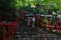 2 Kimono ladies struggled through rain to measure of faith.