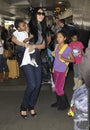 Kimora Lee Simmons with children at LAX Royalty Free Stock Photo