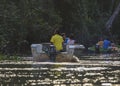 Kinabatangan, Malaysia - 1 December 2019 : Tourists on a boat cruise along the river of Kinabatangan, some of the most diverse