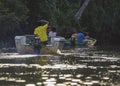 Kinabatangan, Malaysia - 1 December 2019 : Tourists on a boat cruise along the river of Kinabatangan, some of the most diverse