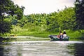 Kinabatangan, Malaysia - 09 May 2013 : Tourists on a boat cruise along the river of Kinabatangan