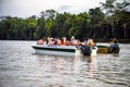 Kinabatangan, Malaysia - 09 May 2013 : Tourists on a boat cruise along the river of Kinabatangan, some of the most diverse concent