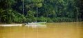 Kinabatangan, Malaysia - 09 May 2013 : Tourists on a boat cruise along the river of Kinabatangan, some of the most diverse