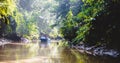 Ourists on a boat cruise along the river of Kinabatangan, some of the most diverse concentration of wildlife in Borneo