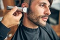 Close up of young man being in barbershop Royalty Free Stock Photo