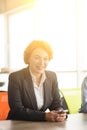 Kind business woman in office Royalty Free Stock Photo