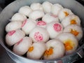 Kind of Chinese snacks steamed stuff buns in Pot steaming pressure for sale people at outdoor beside road Royalty Free Stock Photo