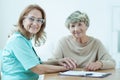 Kind female medic with patient Royalty Free Stock Photo