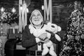 Kind grandpa with soft toys. Christmas decoration. Charity and kindness. Lovely hug. Santa Claus. Mature man with white Royalty Free Stock Photo