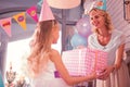 Kind loving mother feeling happy while greeting her daughter Royalty Free Stock Photo