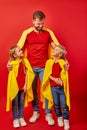 Kind responsible father with children pretend to be superhero