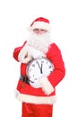 Kind Santa Claus pointing to clock, isolated on white background