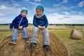 Children on hay bales Royalty Free Stock Photo