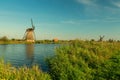 Kinderdijk canals with windmills. Sunset in Dutch village Kinder Royalty Free Stock Photo