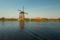 Kinderdijk canals with windmills. Sunset in Dutch village Kinder