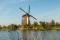 Kinderdijk canals with windmills. Sunset in Dutch village Kinder
