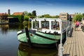 Kinderdijk, The Netherlands, August 2019. Tourist boat to take the guided tour of the canals overlooked by the historic mills. Royalty Free Stock Photo