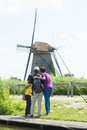 Tourists making a self portrait in Kinderdijk