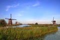 Kinderdijk windmills in the netherlands in a row Royalty Free Stock Photo