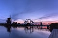 Kinderdijk windmills in the netherlands on sunset Royalty Free Stock Photo